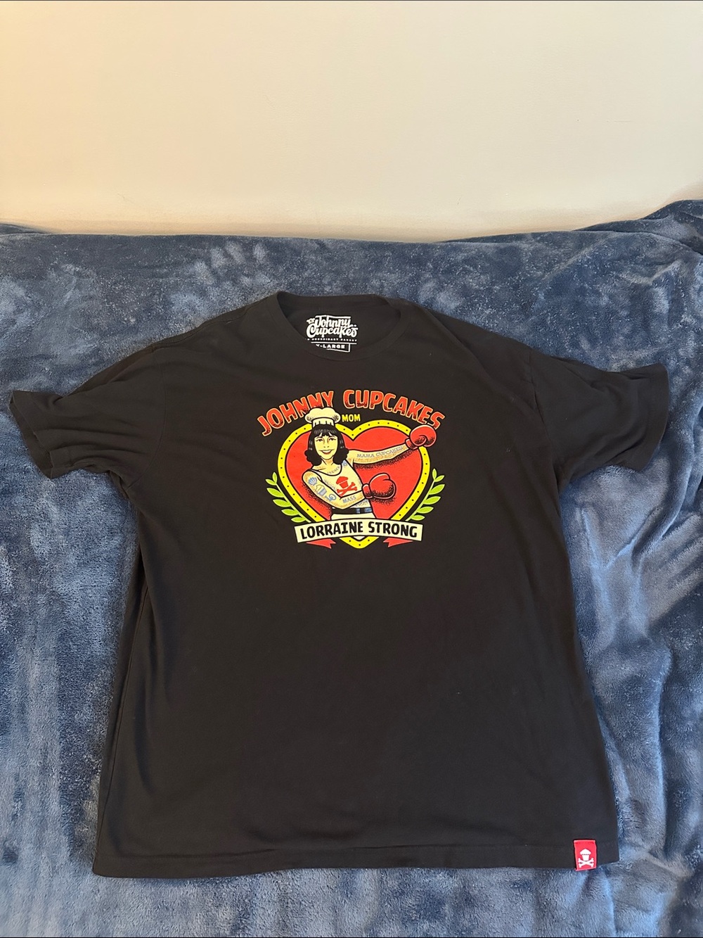Johnny Cupcakes Black Tee with Red and Yellow Lorraine Strong Graphic